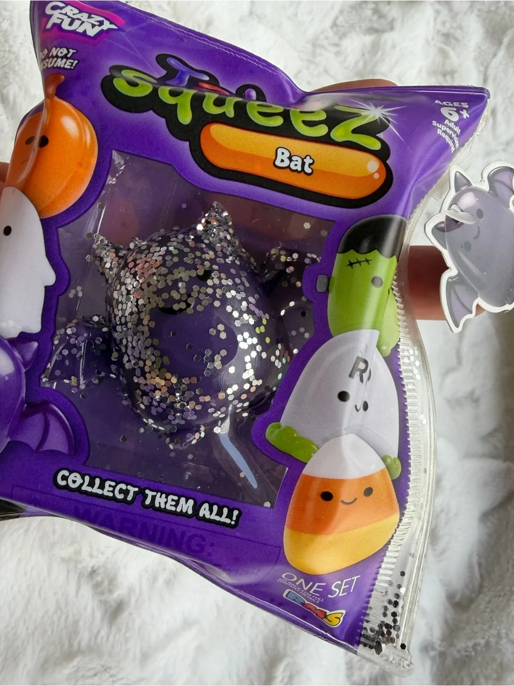 💜🦇 **TABA SQUEEZE THE BAT – PURPLE GLITTER MINI HALLOWEEN SQUISHY!** ✨🎃